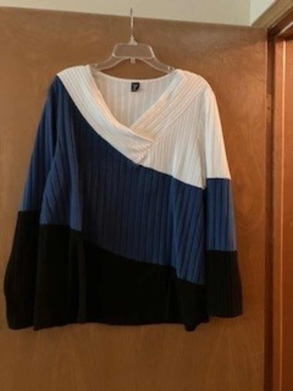 White, blue and black long sleeve sweater top